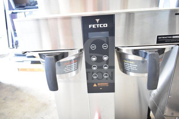Fetco CBS-1242 Commercial Plus Series Twin Automatic Digital Coffee Brewer, shown in stainless steel finish, with control panel display.