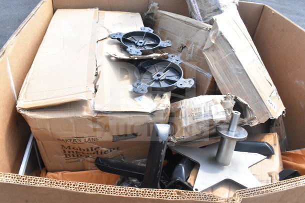 Cardboard box with 16 brand new scratch and dent items, including table leg pieces, some in original packaging.