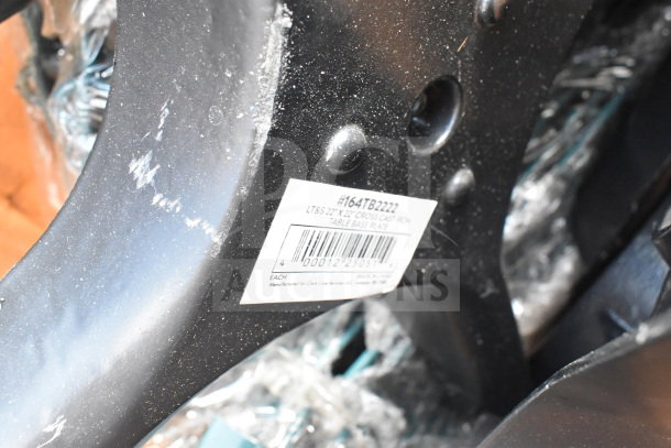 16 new scratch and dent table leg pieces, LT&S 22"x22" cross cast iron table base plate. Label #164TB2222 visible.