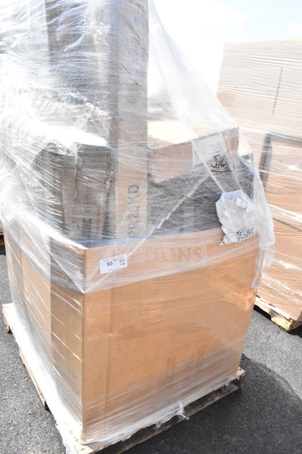 Pallet wrapped in plastic with boxed items, includes tongs, Moscow mule mugs, and sink. Label indicates lot number 93.