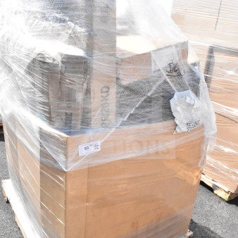 Pallet wrapped in plastic with boxed items, includes tongs, Moscow mule mugs, and sink. Label indicates lot number 93.