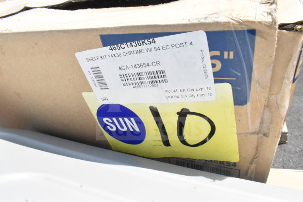 Cardboard box labeled "SHELF KIT 14X36 CHROME W/ 54 EC POST 4" alongside a "SUN 10" sticker.