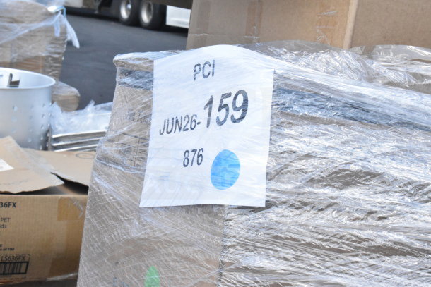 28 new scratch and dent items wrapped in plastic, including serving bowls, a platter, and glasses. Label marked JUN26-159.