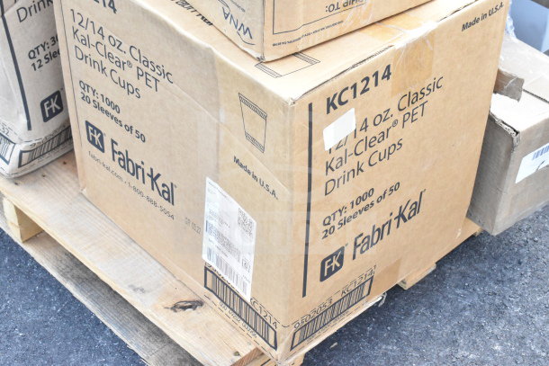Cardboard boxes of Fabri-Kal 12/14 oz. Kal-Clear PET drink cups, 1000 count per box, on a pallet.