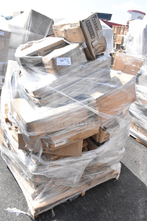 Plastic-wrapped pallet of 30 new scratch and dent items, including hood filters and glasses. Various labeled boxes visible.