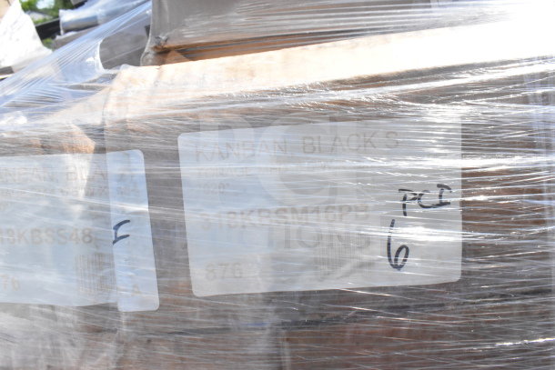 Plastic-wrapped pallet containing 30 scratch and dent items. Visible label reads "KANBAN BLACK S" with handwritten "PCI 6."