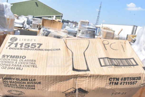 Cardboard box labeled "Libbey 711557" containing one dozen Symbio cocktail glasses, 12 oz (444 ml), brand new condition.