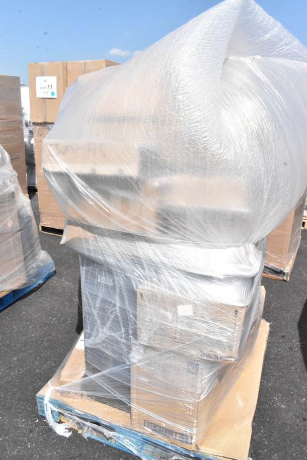 Plastic-wrapped pallet with 26 new scratch and dent items, including a cup dispenser, lid organizer, and trash can.