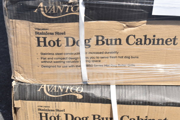 Stainless steel hot dog bun cabinets by Avantco, boxed, new, with scratch and dent marks, stack of two.