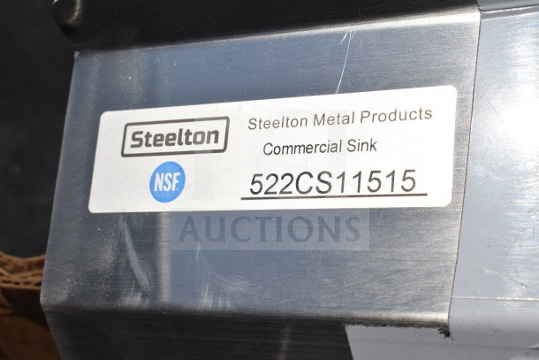 Steelton commercial sink label with model 522CS11515 and NSF certification, part of a scratch and dent auction lot.