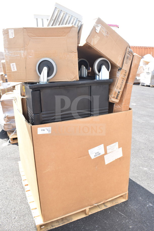 Cardboard box on pallet with scratch and dent items, including a rack and bucket seat. New condition, various labels visible.