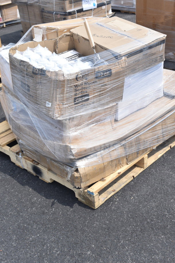 Pallet with boxed items including wide mouth squeeze bottles and other new scratch and dent items, shrink-wrapped and ready for auction.