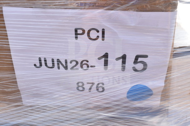 Pallet wrapped with plastic, labeled "PCI JUN26-115 876." Contains 12 new scratch and dent items, including a floor mat and beer tower.