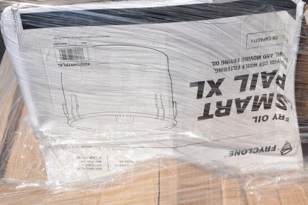 Shrink-wrapped items including Smart Pail XL box, possibly containing scratch and dent items like floor mat, beer tower, glasses.