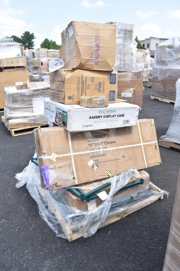 Stack of boxed items including Regency 18"x48" chrome shelving and Choice bakery display case on pallet, lightly dented boxes.
