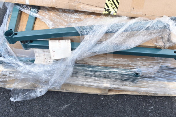 Brand new scratch and dent items, includes frame for wire shelving, utility cart. Wrapped in plastic with visible labels.