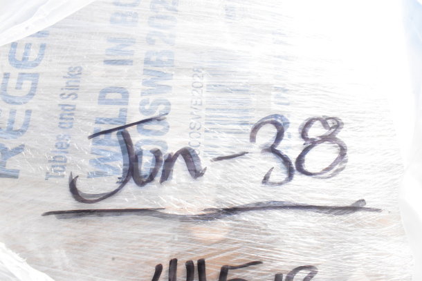 Packaged items labeled "Jun-38," possibly scratch and dent, in plastic wrap. Includes trash can, stools. 20 items total.