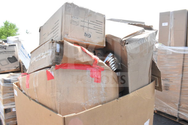 18 new scratch and dent items including a taco holder, fry pan, and trash can in assorted damaged boxes.