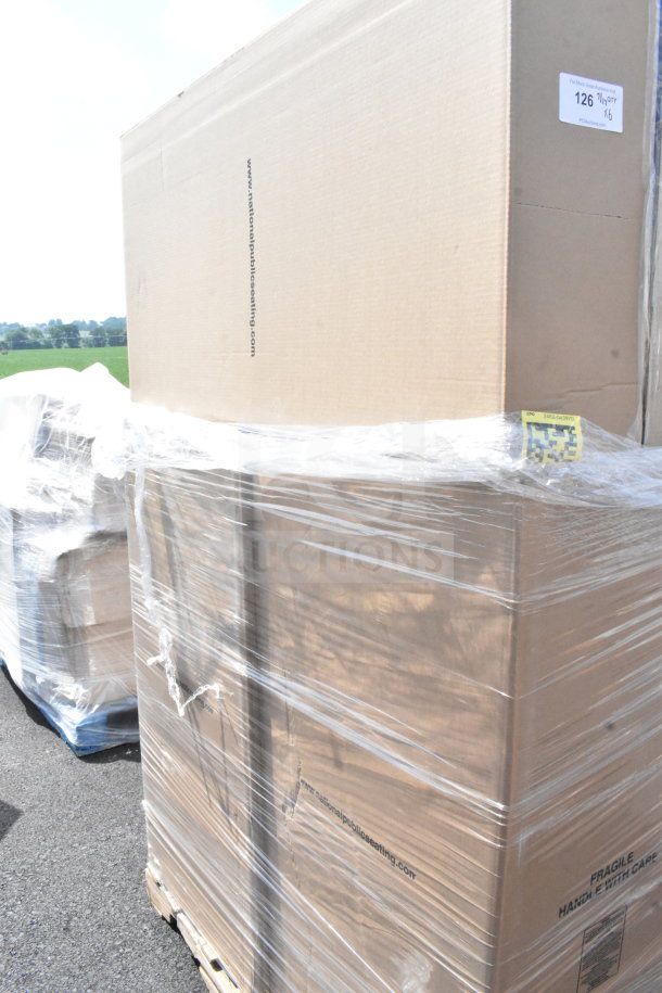 A large, wrapped pallet containing boxes labeled "Lancaster Table & Seating" for banquet chairs.
