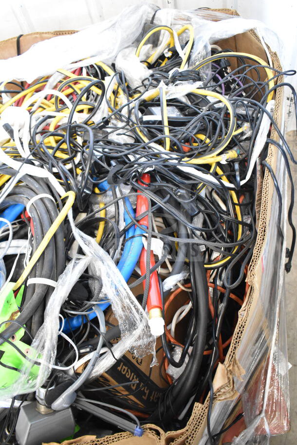 Lot of various cables in assorted colors and types, bundled in a large box, mixed condition, ideal for tech projects.