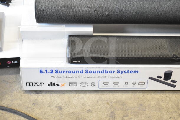 5.1.2 Surround Soundbar System display, including wireless subwoofer and speakers, featuring Dolby Atmos and DTS:X technology.