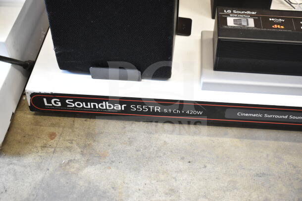 LG Soundbar S55TR display with 5.1 channel, 420W capacity, includes sound bar and four speakers. Visible labels show features.