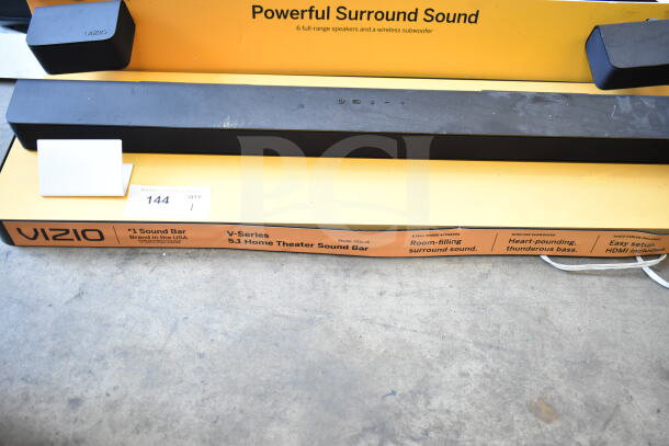 Vizio V-Series 5.1 sound bar display with speakers. Features surround sound, wireless subwoofer. Model: V51x-J6.