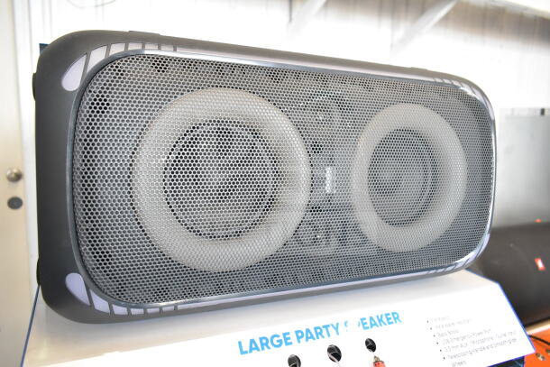 Onn Large Party Speaker, store display model. Features dual speakers, mesh grille, sturdy black frame. Excellent condition.