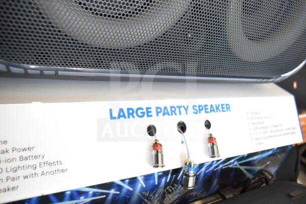 Onn Large Party Speaker in display, features include FM radio and bass boost. Good condition, visible controls and labels.
