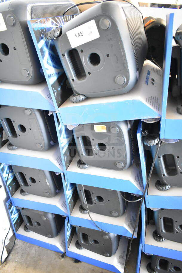 Onn Large Party Speakers in store display. Features include wheels, durable casing. Visible tags read "148" and "4x."