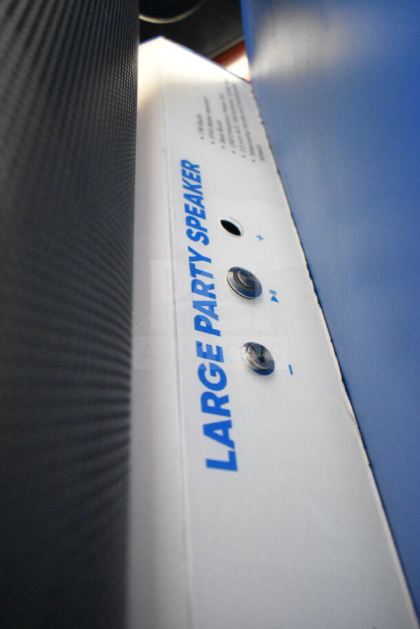 Onn Large Party Speaker in white box, featuring control buttons; part of a 4-store display auction item.