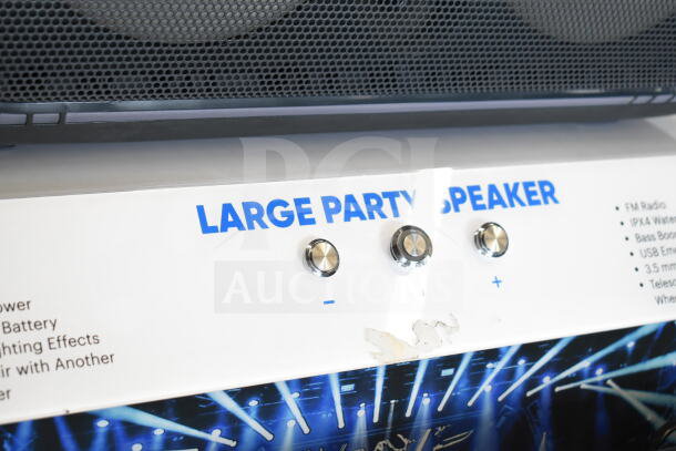 Onn large party speaker display with volume knobs and specifications like FM radio, IPX4 water resistance, USB, and more.