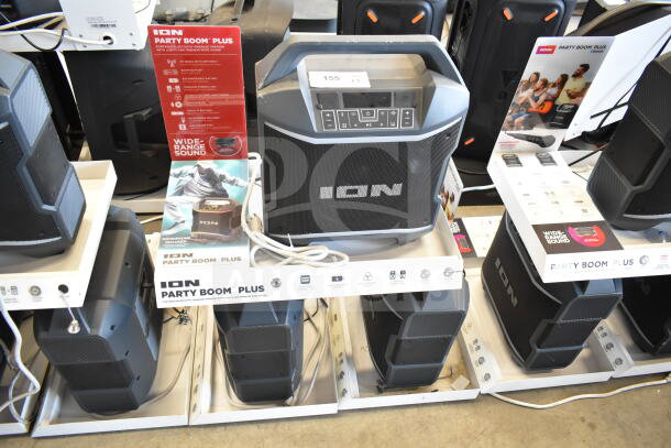 Ion Party Boom Plus speakers on store display. Includes three units. Features wide-range sound, rechargeable battery.