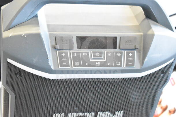 Ion Party Boom Plus Speaker, gray casing, features Bluetooth, mic input, USB port. Good condition, slight wear visible.
