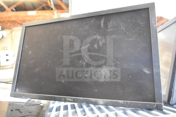 Three computer monitors: elo, Dell, LG. Shows a Dell monitor; used condition, slight surface marks. Auction lot, 3x your bid.