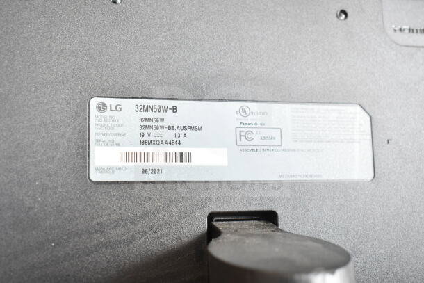 LG monitor label, model 32MN50W-B, manufactured 06/2021, 19V 1.3A, factory ID GX, serial 106MXQAA4644.
