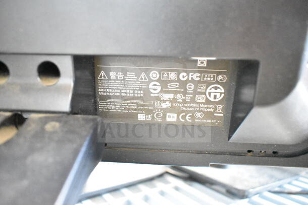 5 various monitors including Dell and Sanyo. Features and condition unspecified. Label indicates regulatory compliance.