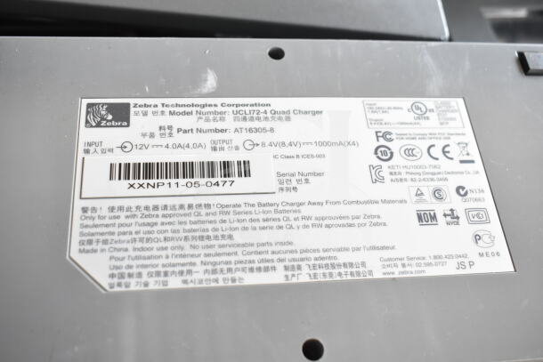Label of Zebra UCLI72-4 Quad Charger, input 12V 4.0A, output 8.4V 1000mA, for QL and RW series, serial XXNP11-05-0477.