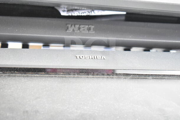 Six monitors, including IBM and Toshiba, visible logos. Mix of conditions, potential bulk purchase value.