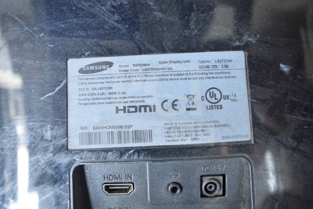 Samsung S27D390H monitor label showing model, HDMI port, and manufacturing details.