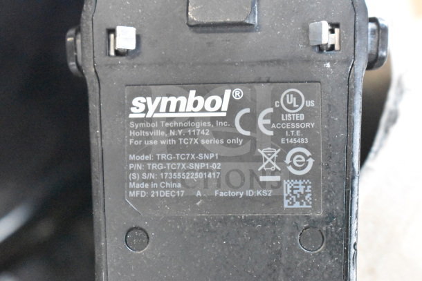 "Symbol Technologies label on device, Model TRG-TC7X-SNP1, P/N TRG-TC7X-SNP1-02, S/N 17355522501417, made in China."