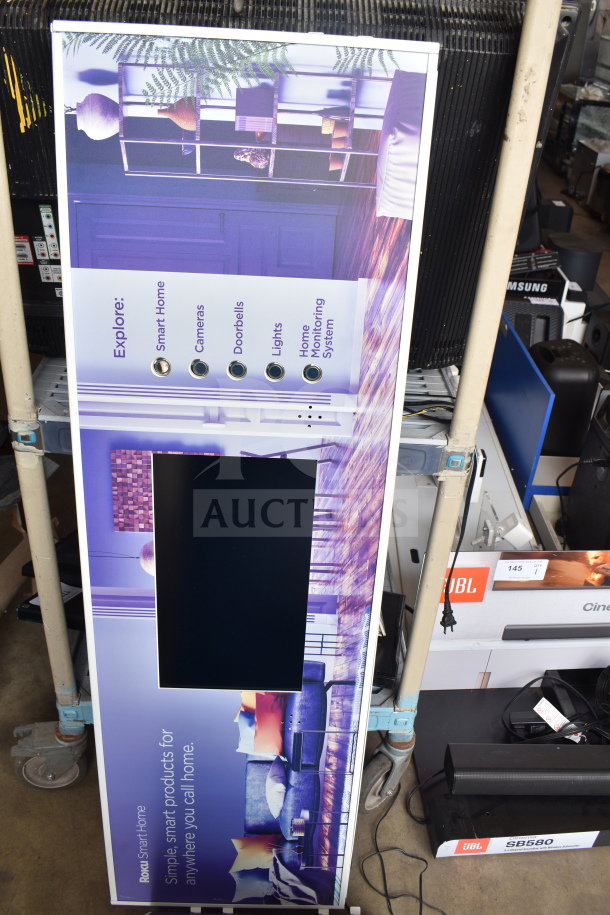 LCD advertising player display for store, featuring smart home product options. Good condition with promotional graphics.