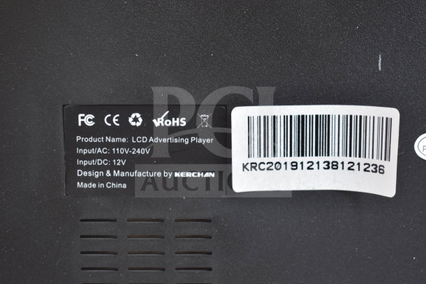 LCD Advertising Player label by Kerchan with input details: AC 110V-240V, DC 12V, Made in China, barcode visible.