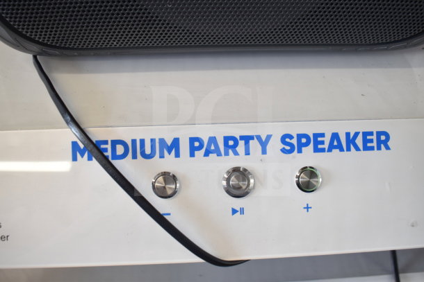 Onn Medium Party Speaker, store display model with control knobs, sleek black design, ideal for events and gatherings.