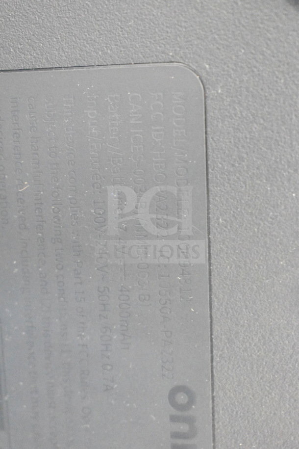 "Onn Medium Party Speaker label showing model 100094891, FCC ID HBOPA2332, battery info 7.4V 4000mAh."