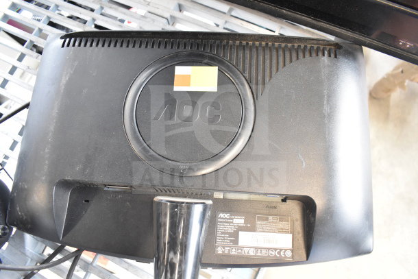 AOC monitor back view, model 2000SW, showing vent design, product label with specs, and power rating, in used condition.