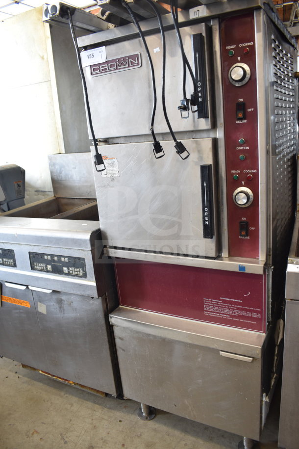 Crown SX-7G3 steam cabinet, 2-deck, natural gas powered, 94,000 BTU, visible knobs and controls, stainless steel exterior.