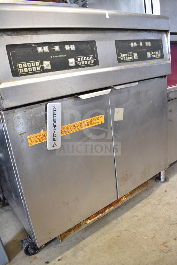 Frymaster FMJ250E deep fryer, natural gas, 2-bay, 122,000 BTU, on casters, digital controls, visible wear and labels.