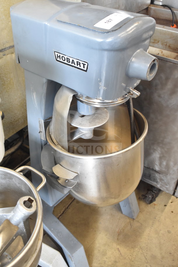 Hobart D300T commercial 30-quart planetary dough mixer with bowl and dough hook. 200V, 3-phase. Visible wear, label intact.
