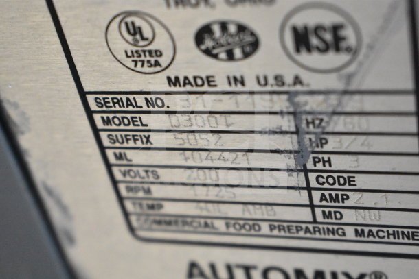 Hobart D300T 30 Qt Planetary Dough Mixer label showing model, volts, and other specifications.